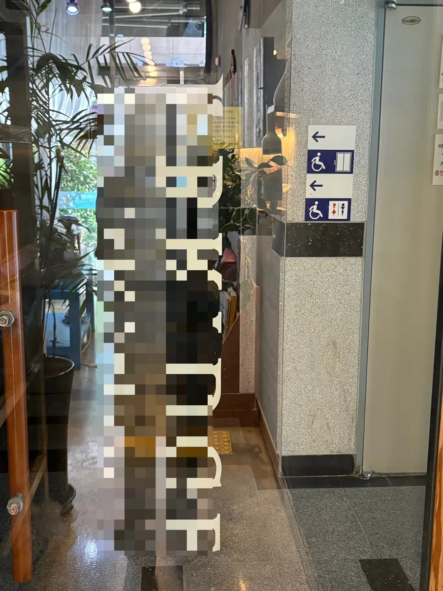 Gender-separated shared building restroom