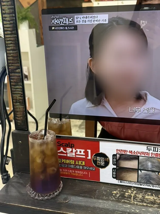 Seat in front of the TV mirror playing video