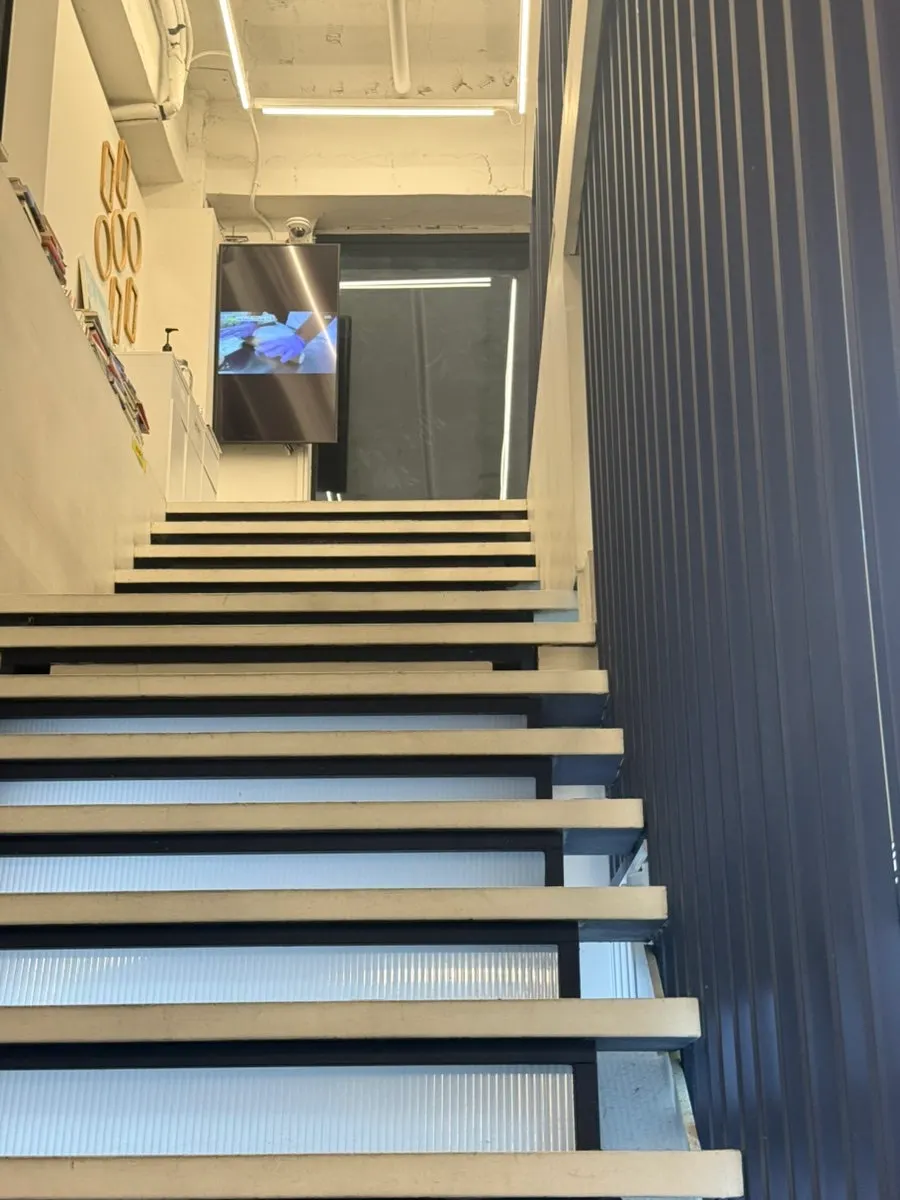 View of the 1st-floor seating at La Cuesta in the evening