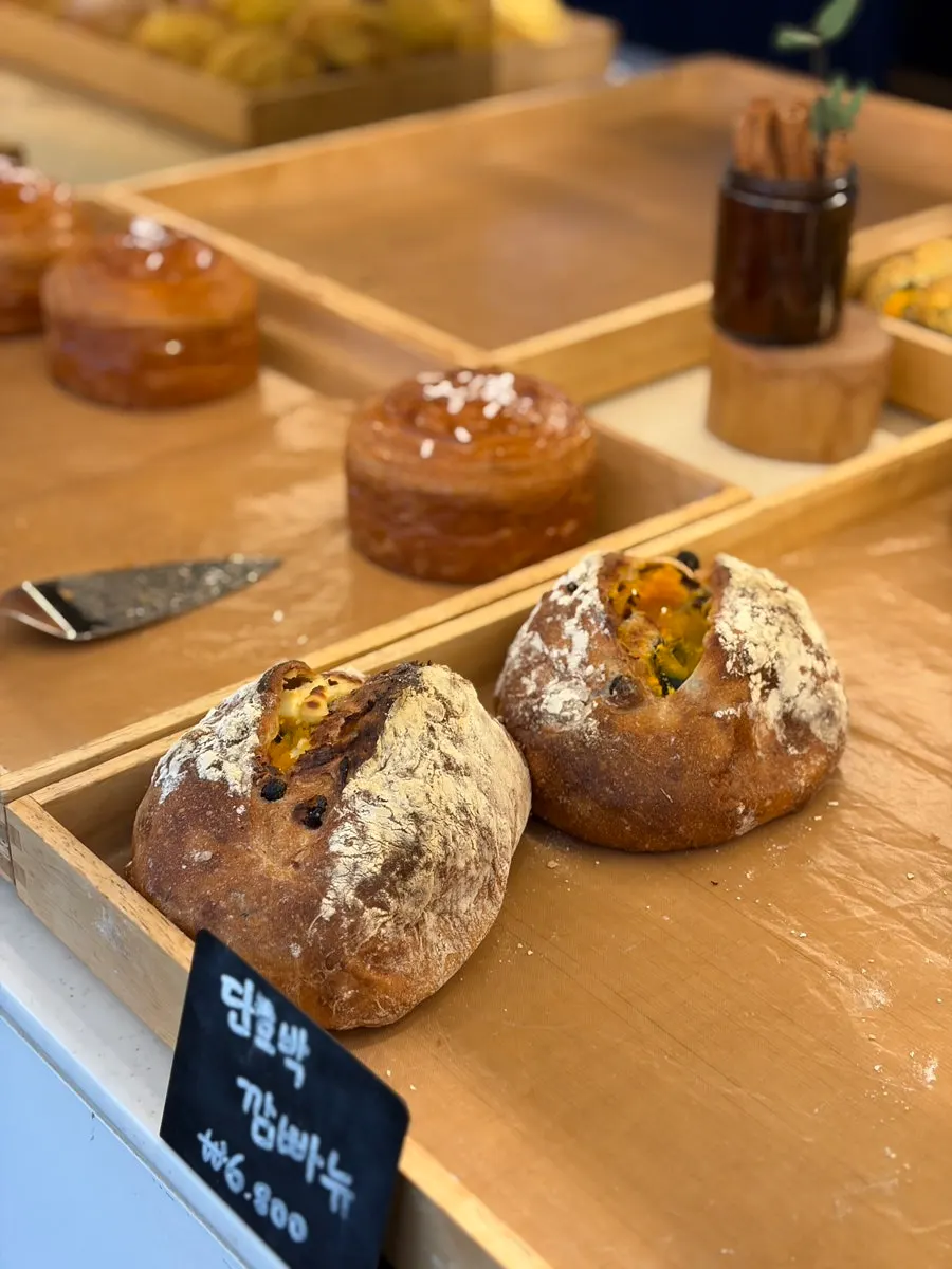 Various breads on display at La Cuesta's bakery counter