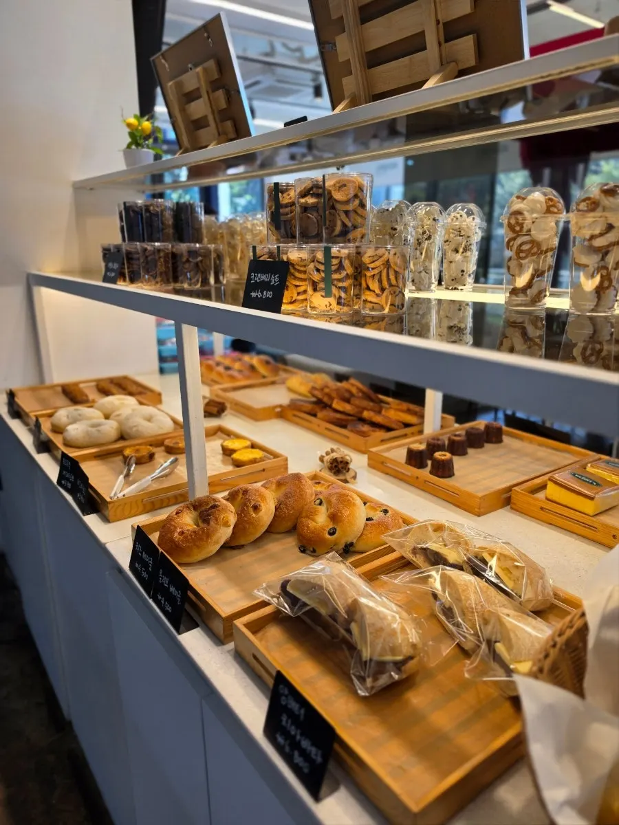 An assortment of breads on the display case