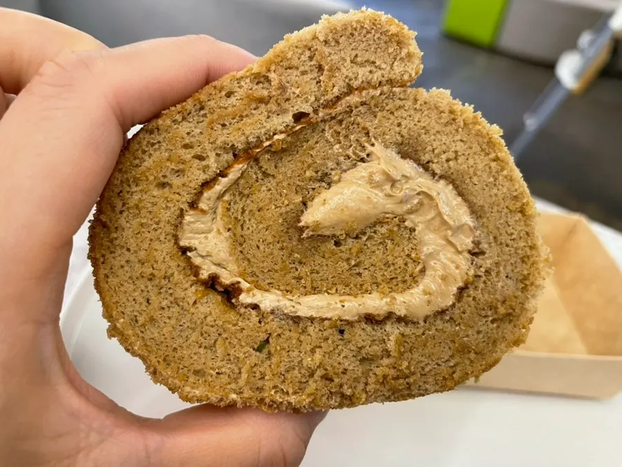Cross-section of the mocha roll with rolled mocha cream