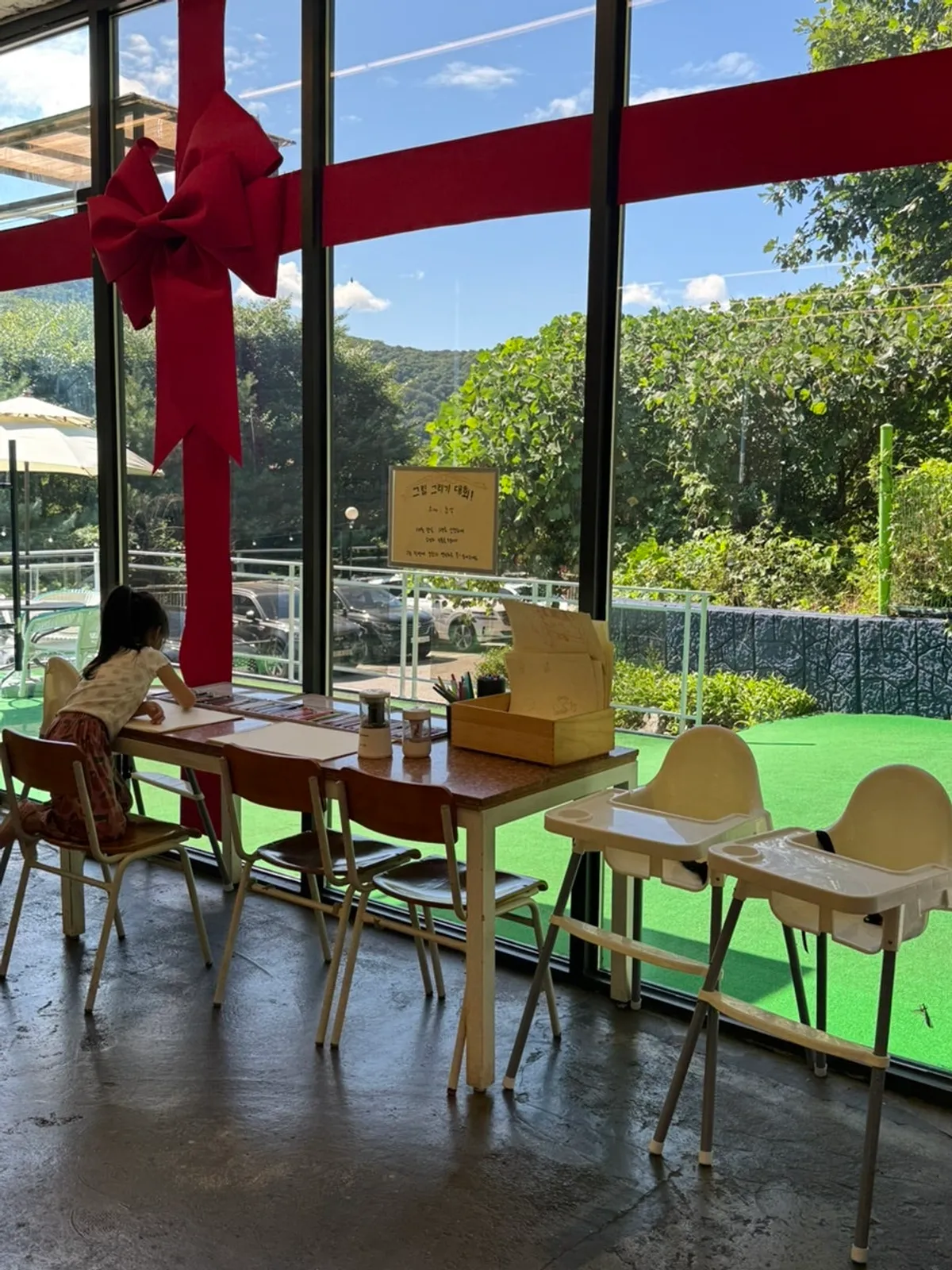 Outdoor garden at La Cuesta with picnic mats and cushions laid out