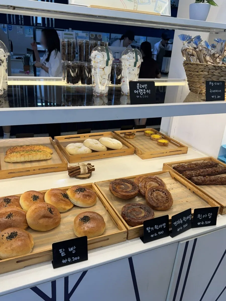 Display case full of various La Cuesta breads