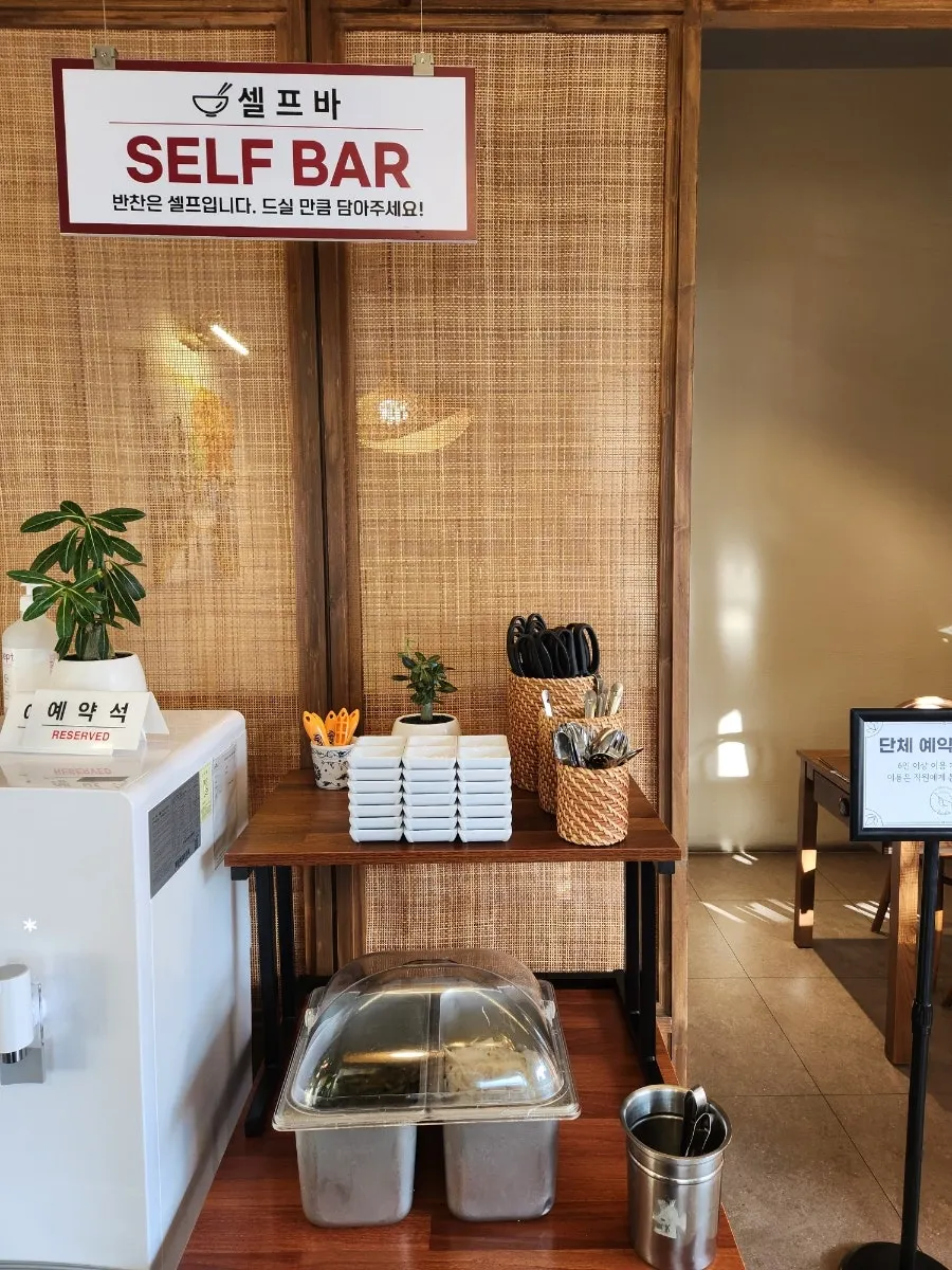 Side dish self-serve bar with pickled onion and pickled chili