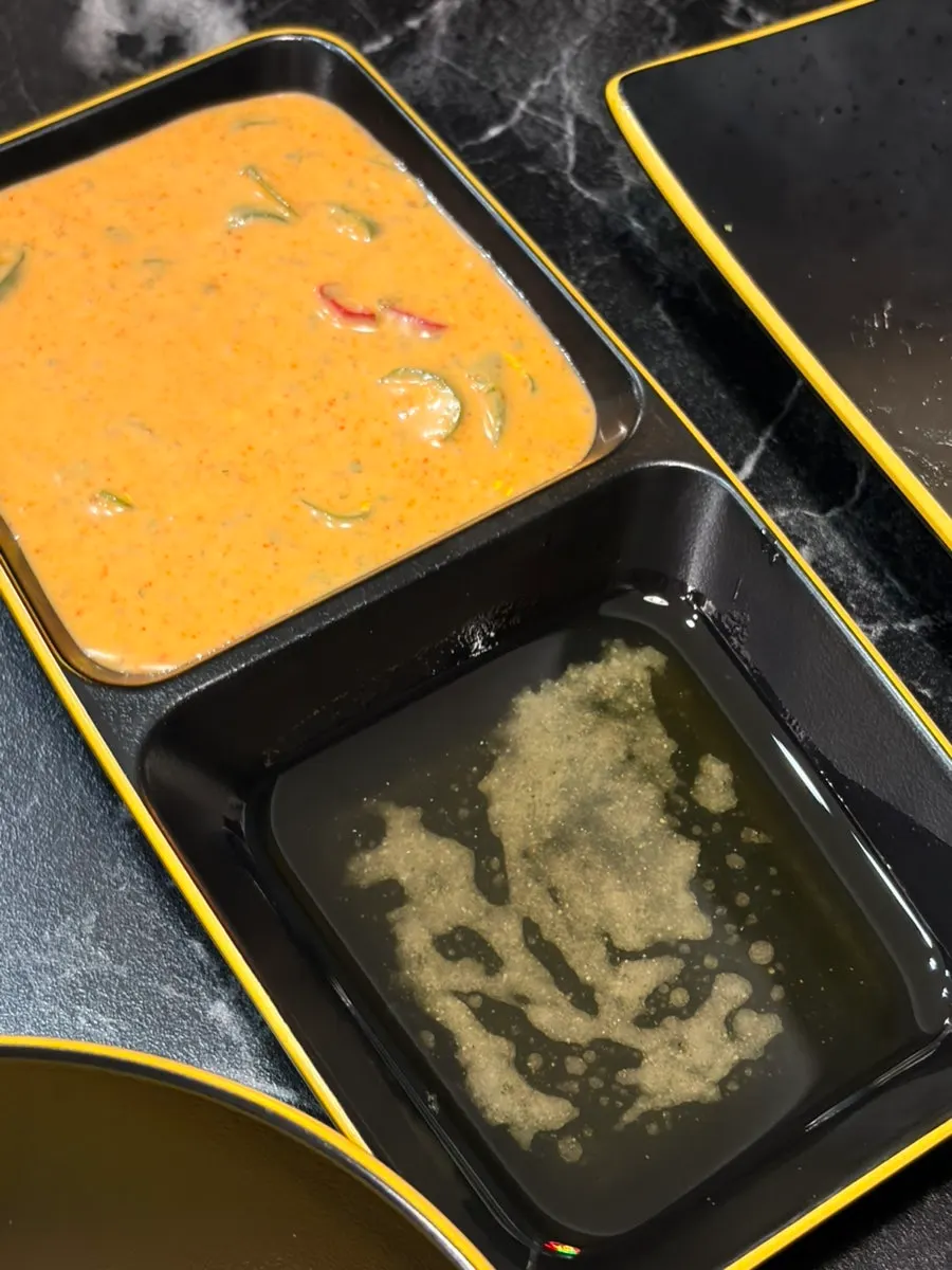 The spicy rose-colored special tangsuyuk sauce