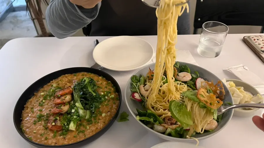 Pasta and risotto served together on the table