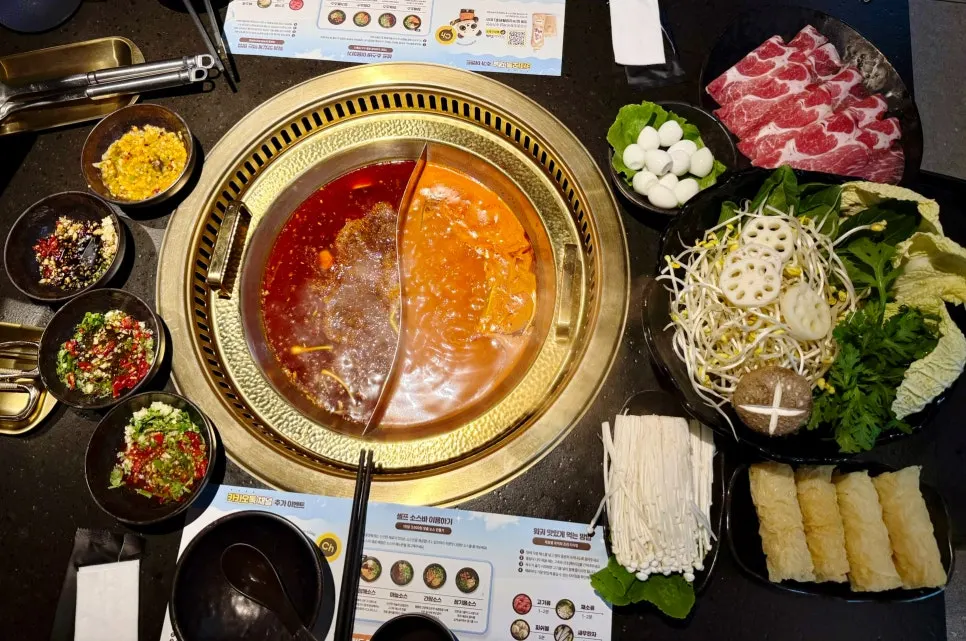 Full table spread of the ordered hotpot menu