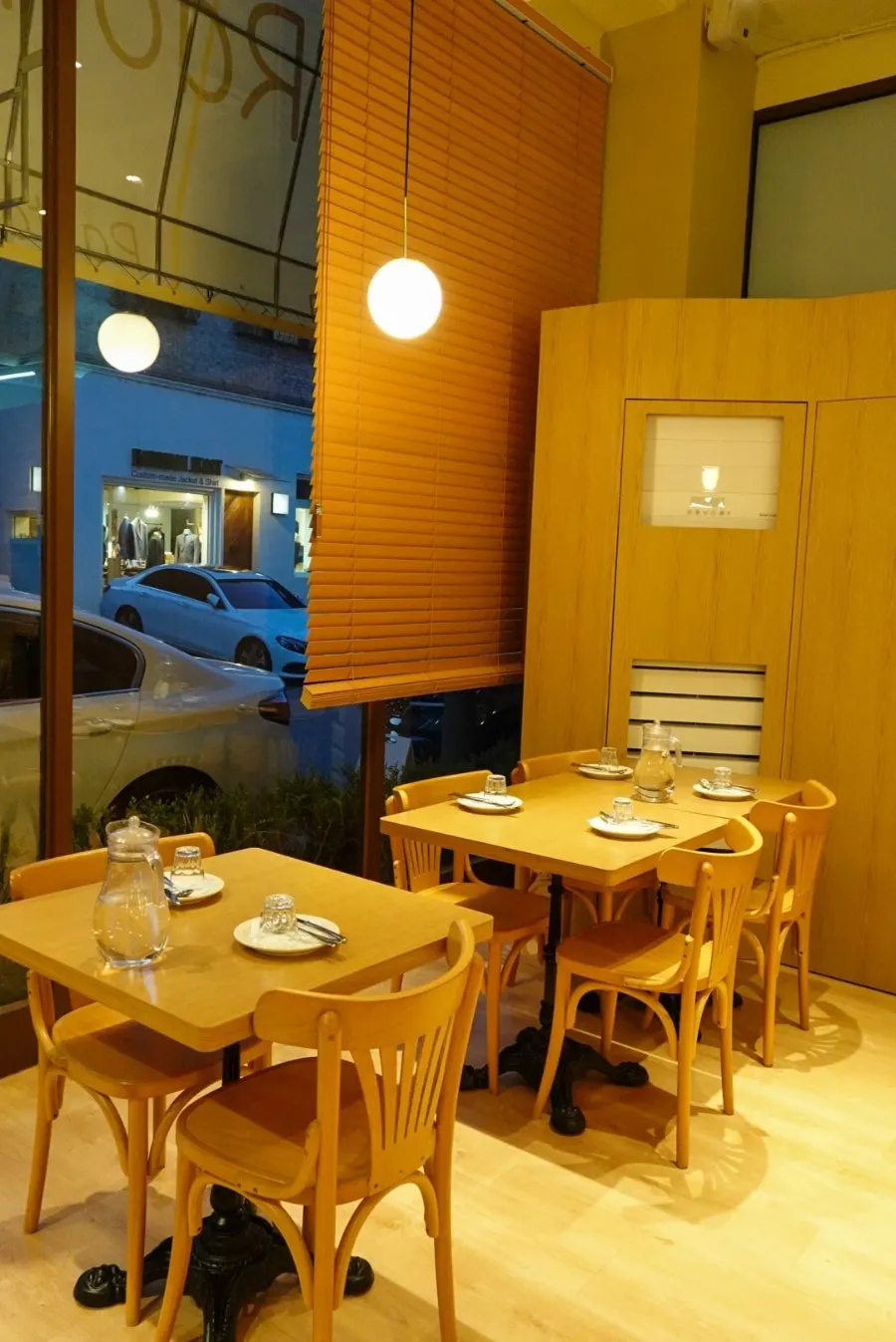 Full view of the Raon Sik Tak dining hall with warm lighting on