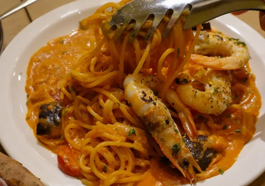 Noodles coated in a tomato-forward rosé sauce