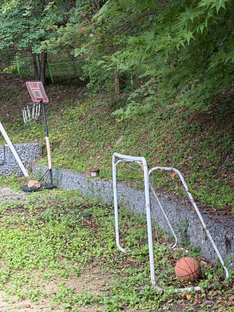 Outdoor space for badminton and basketball