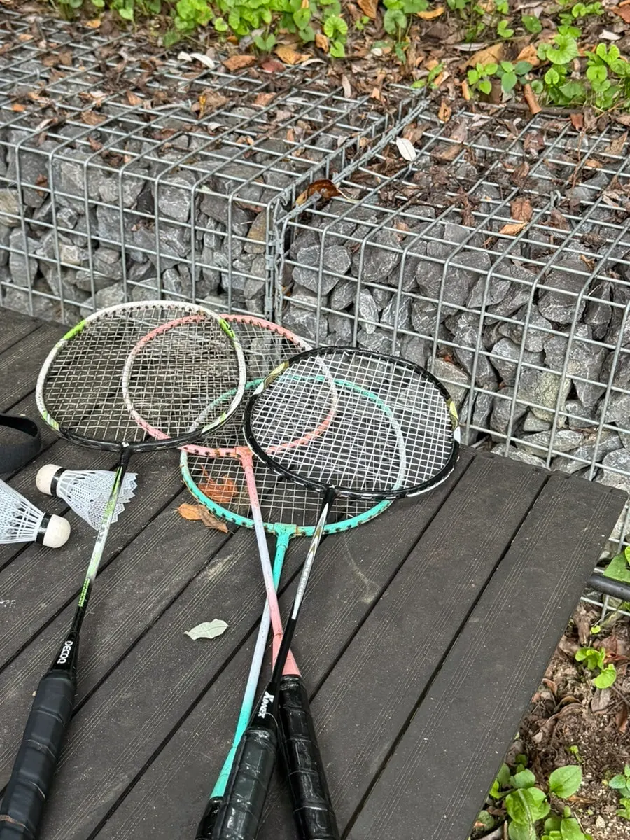 Playing badminton in La Cuesta's outdoor space