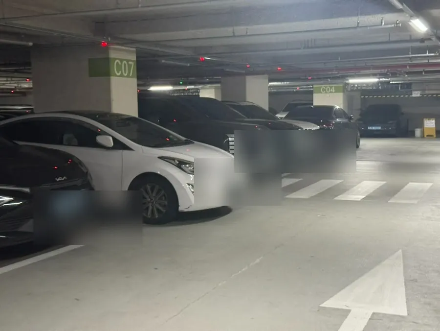 Entrance to the underground parking lot of the building where Lash Doll's Munjeong Station branch is located