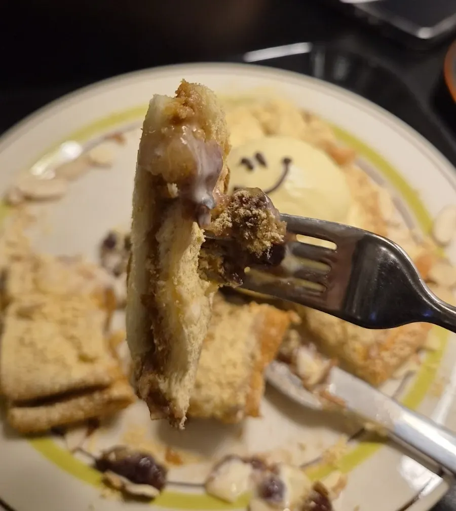 Close-up of Hongrad toast topped with rice cake and nuts
