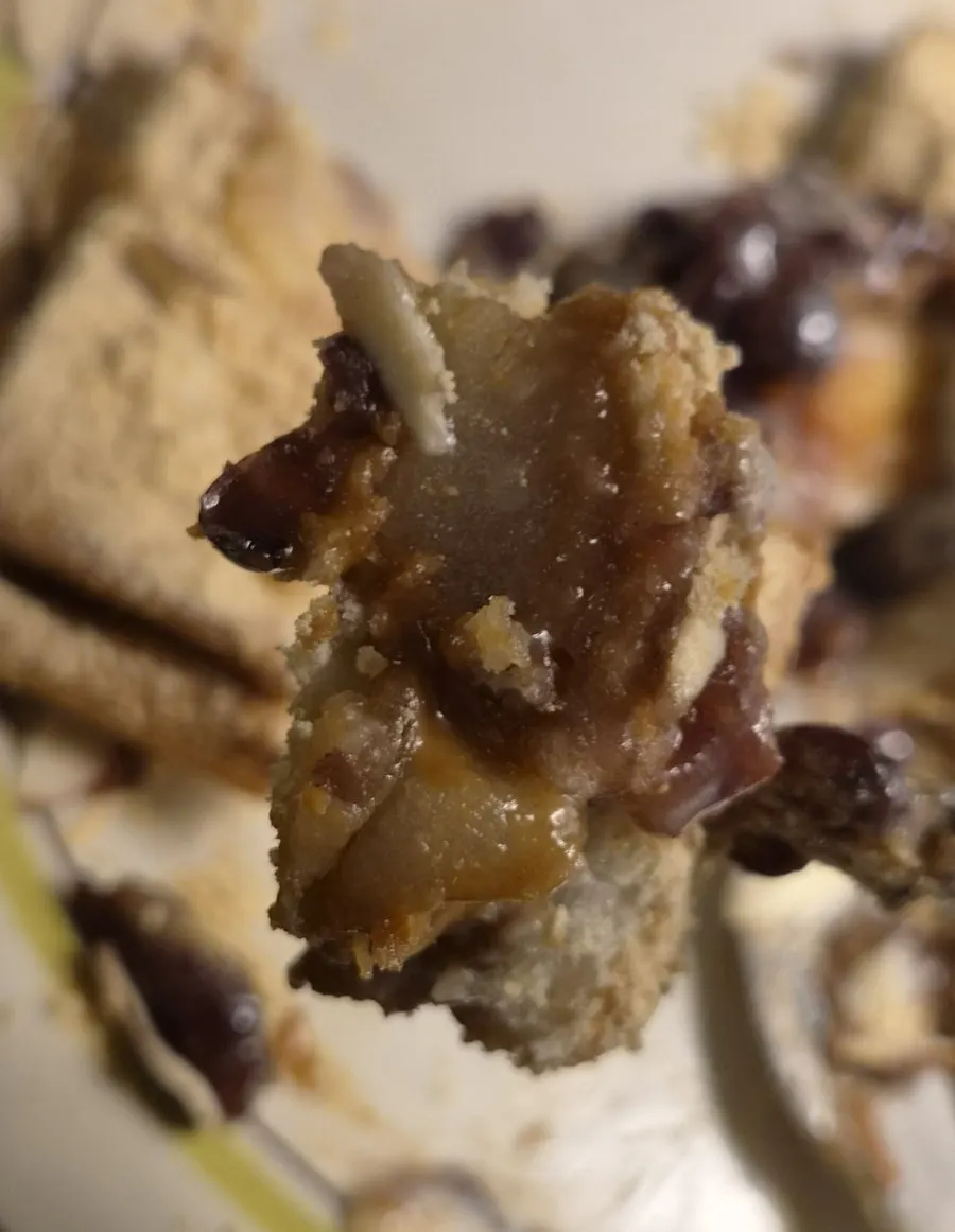 A slice of Hongrad toast showing red bean filling