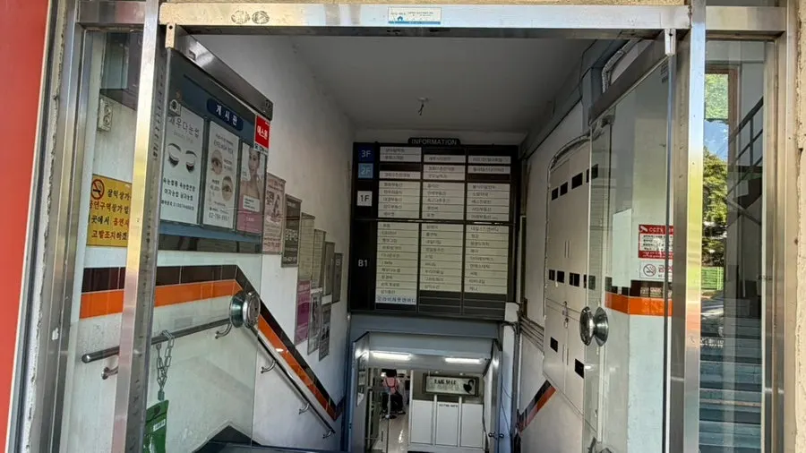 Basement-level entrance passage of Labiche Foot & Body