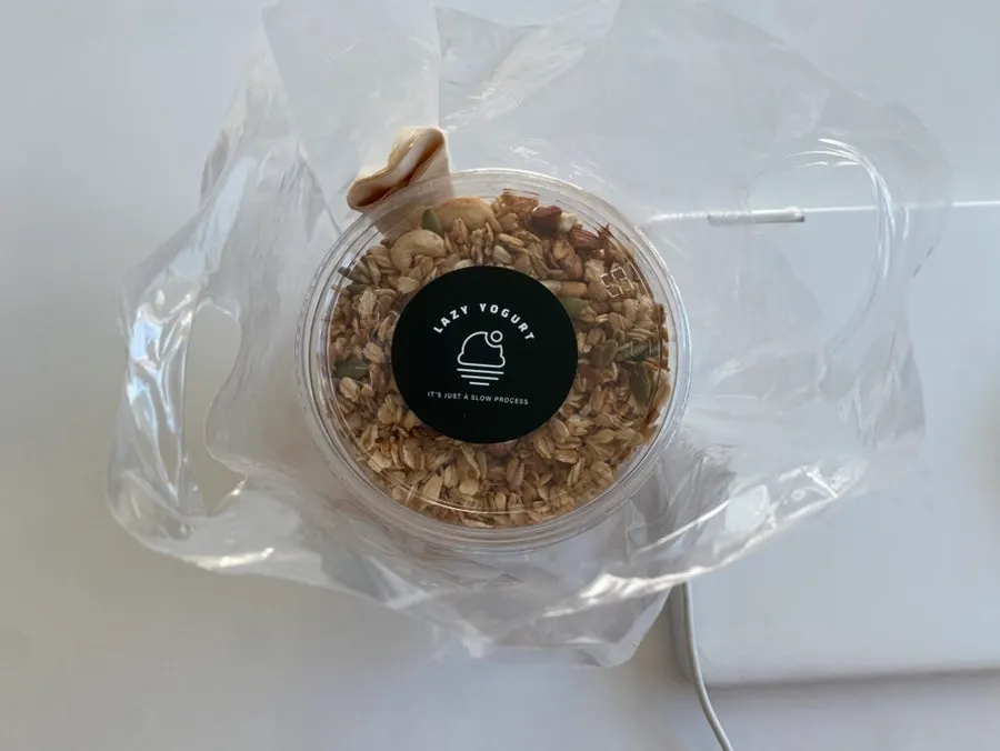 Opening the separately packed granola bag