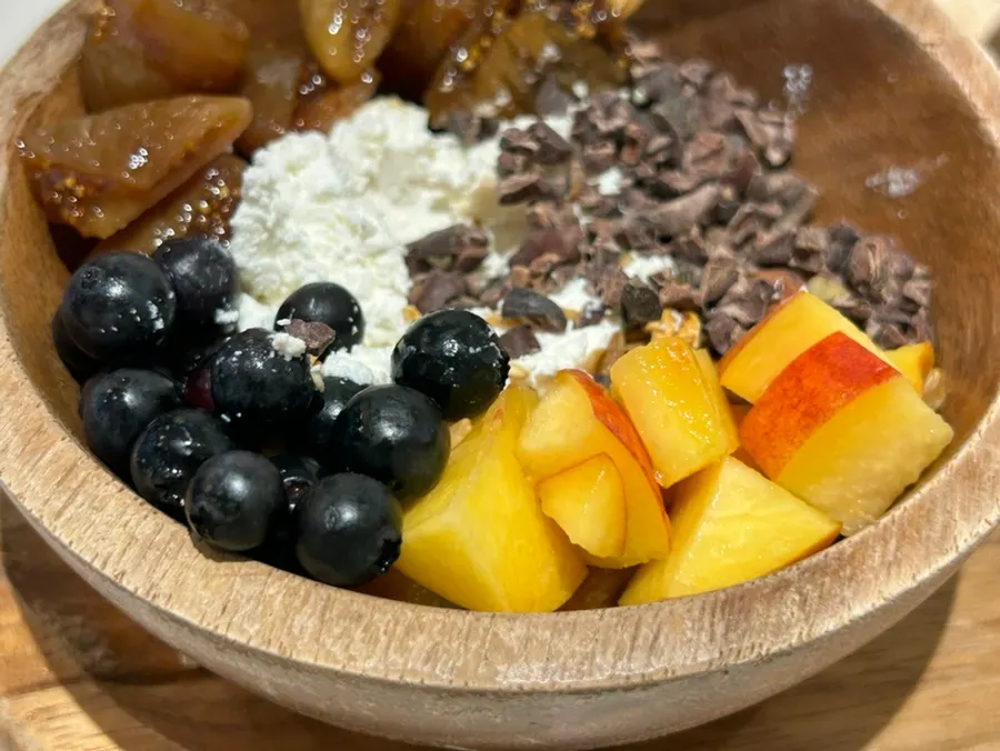 A spoonful of peach and yogurt together