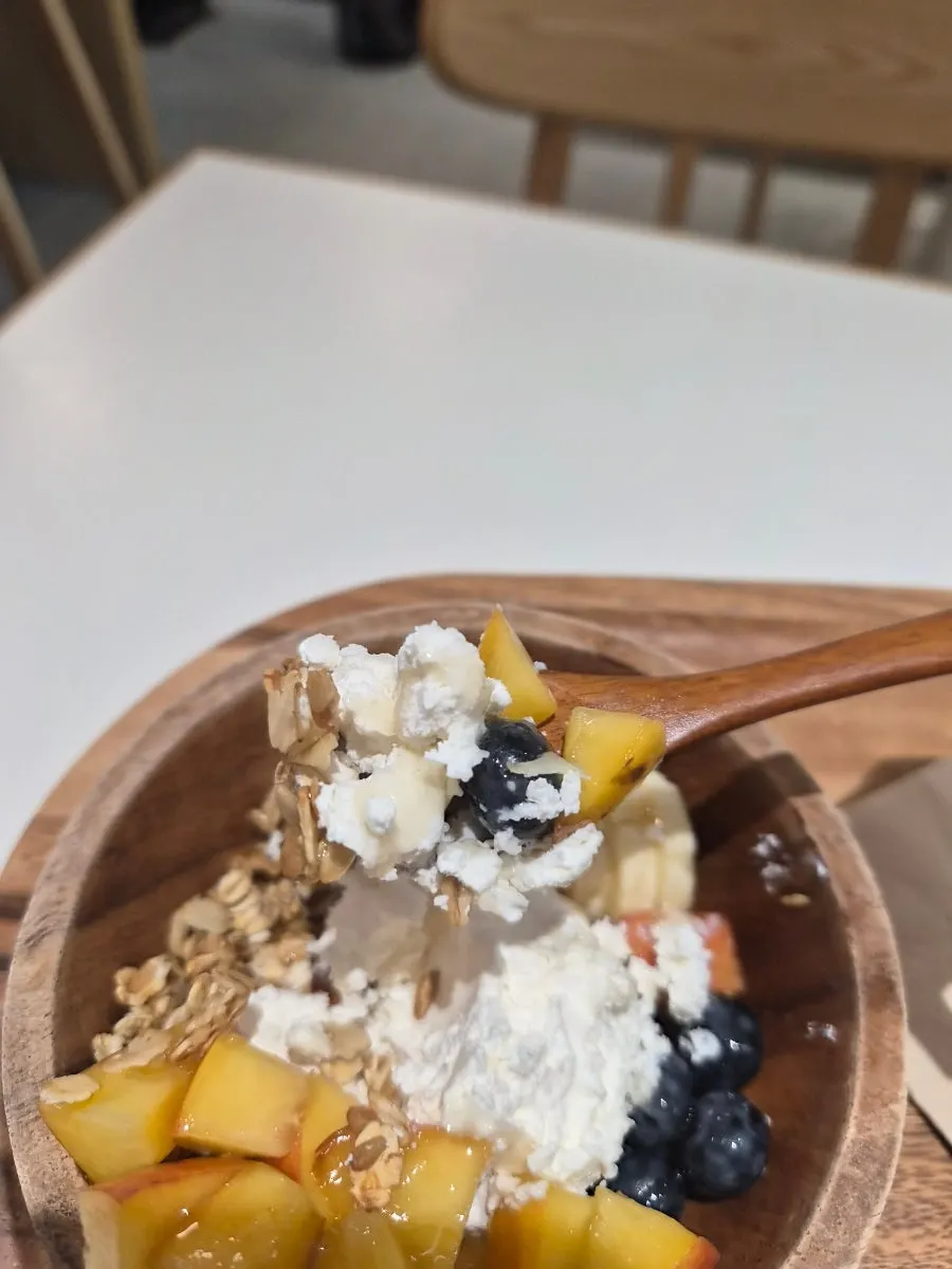 Close-up of Greek yogurt mixed with toppings