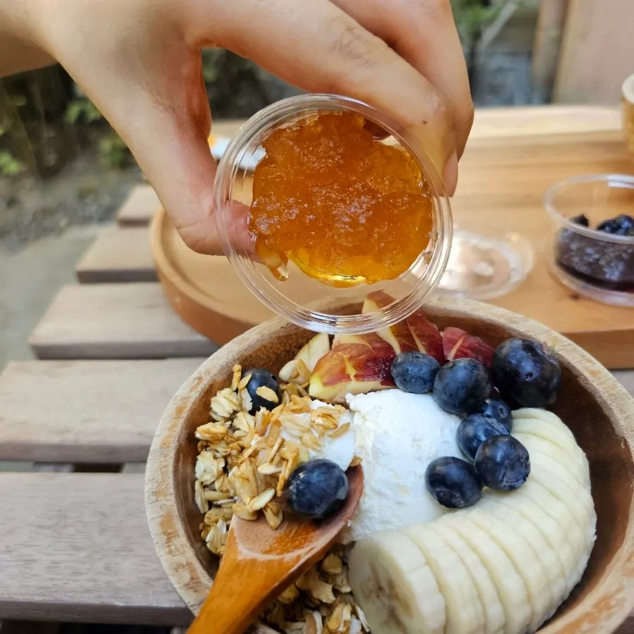 Yogurt bowl topped with banana and blueberry