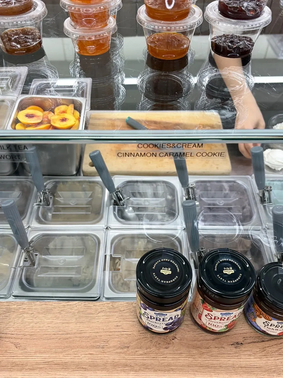 Showcase of fruit and jams for Greek yogurt toppings