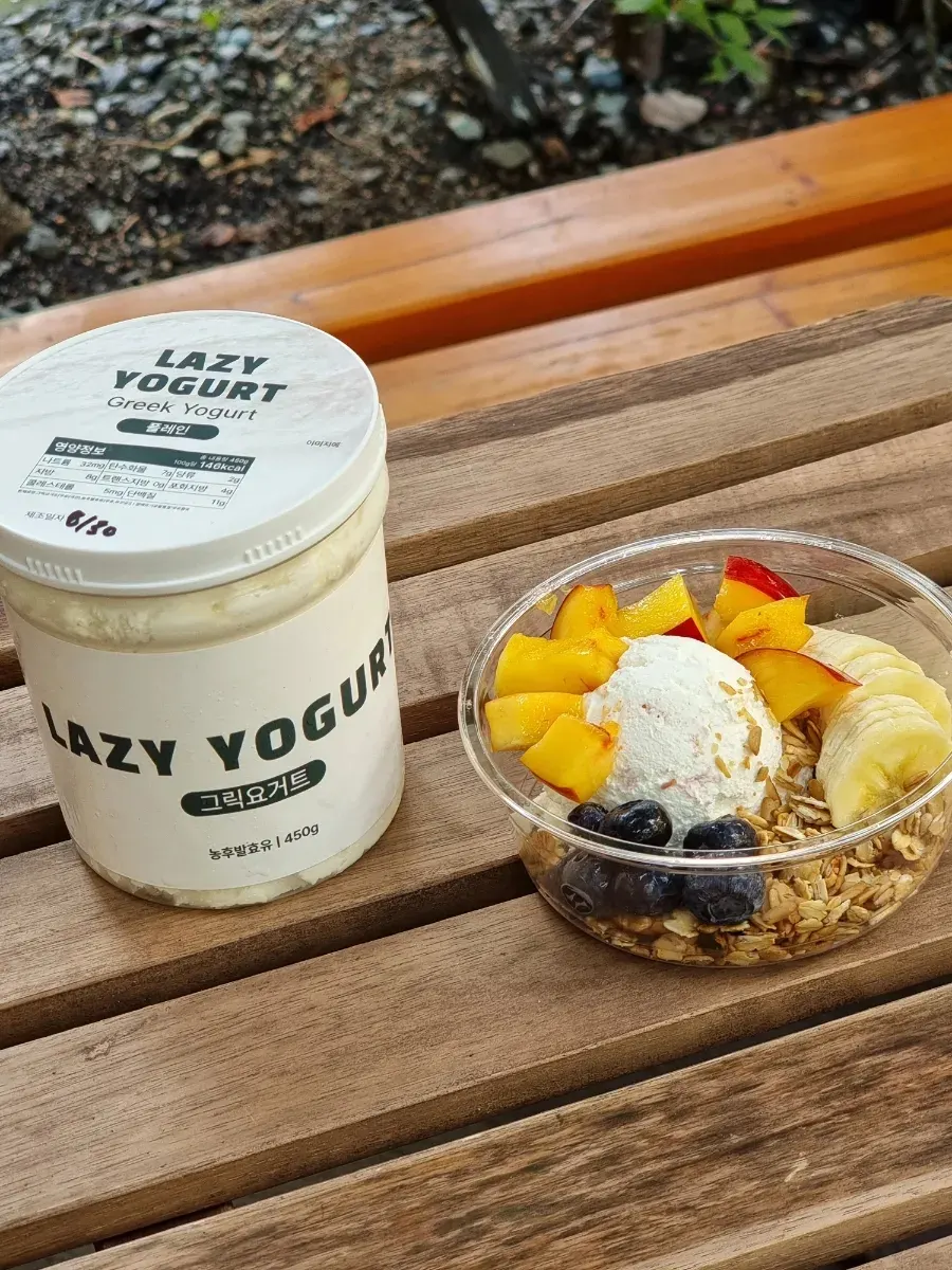 Thick Greek yogurt with banana and blueberry toppings