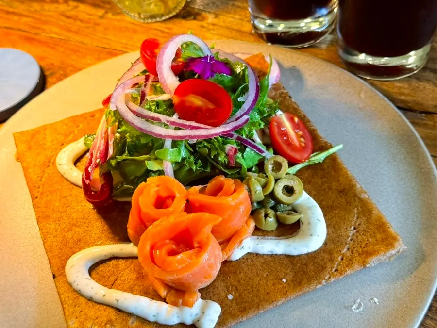A plate of Le Bon Goûter's smoked salmon galette