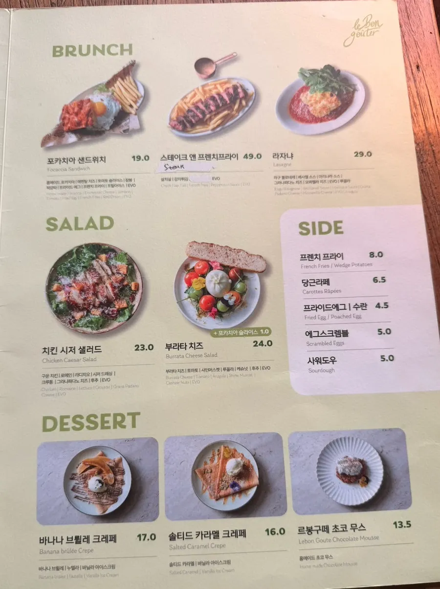 Pasta and salad menu board at Le Bon Goûter