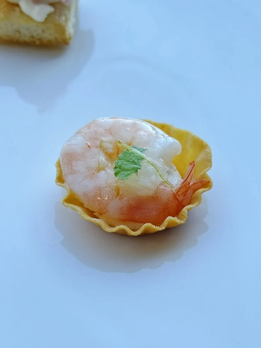 Sweet corn panna cotta topped with caviar, one of the bite-sized starters