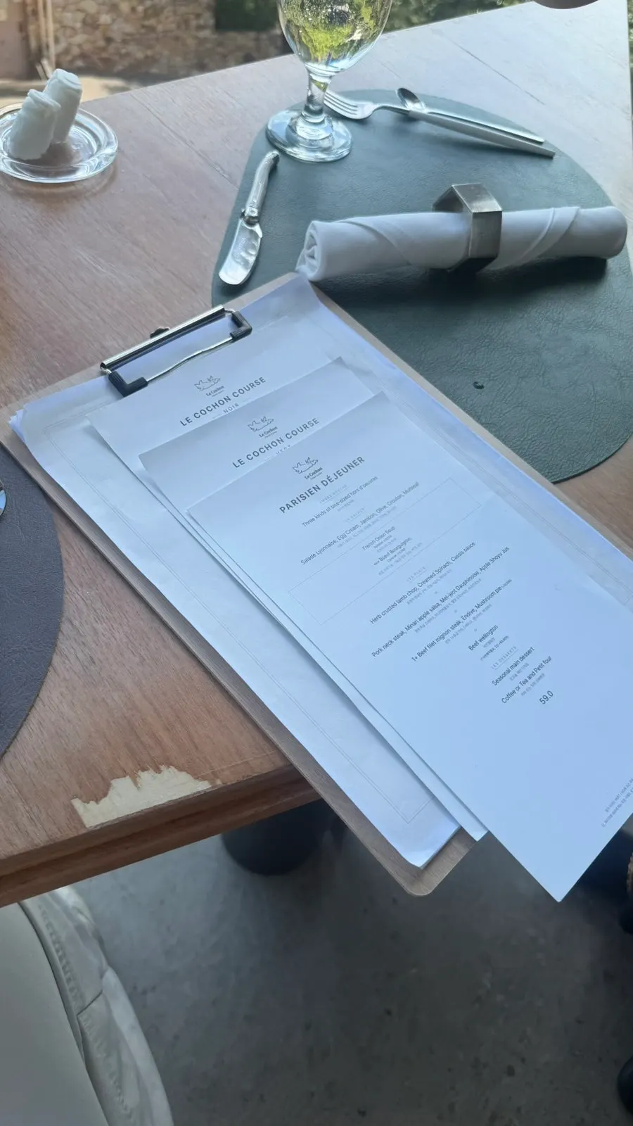 Large center table for groups at Le Cochon