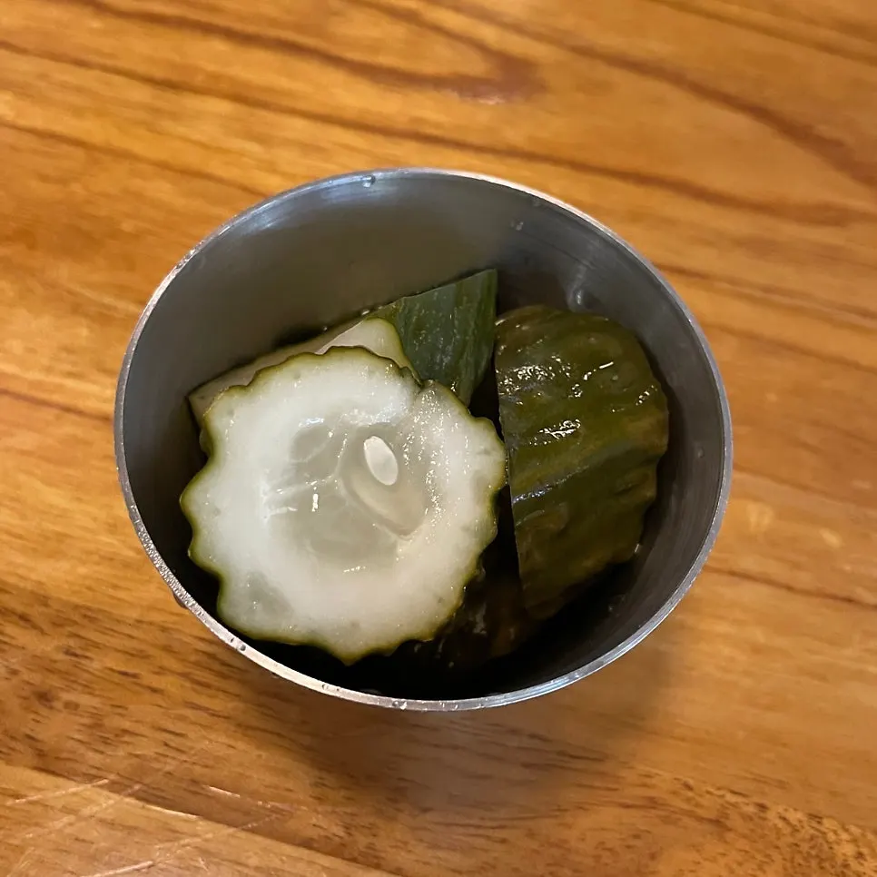 Homemade cucumber pickles served as a basic side dish
