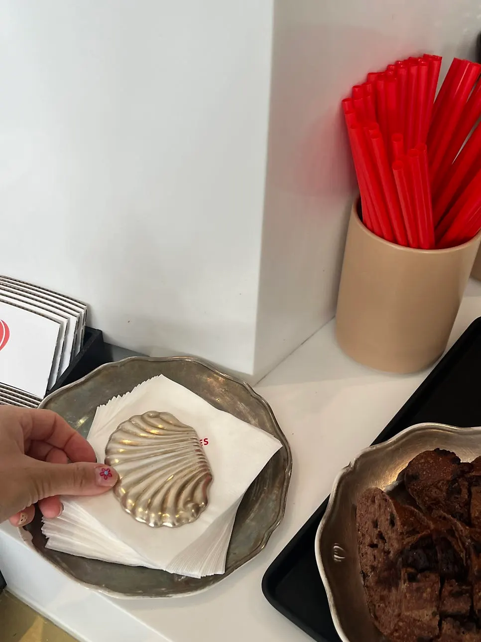 Shell-shaped paperweight sitting on the table