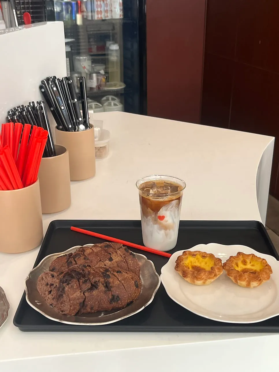 Ordered chocolate baguette and egg tart