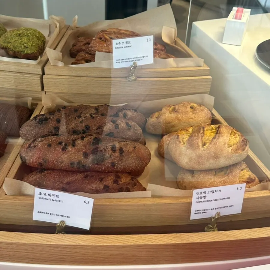 Remangdore financier and madeleine menu price board