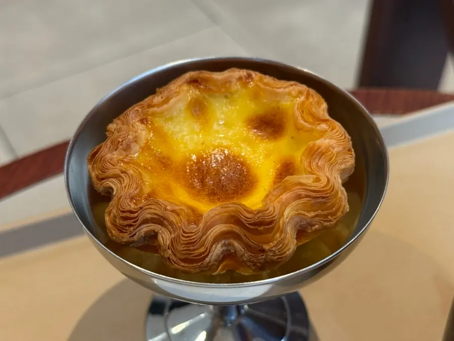 Classic egg tart with visible pastry layers