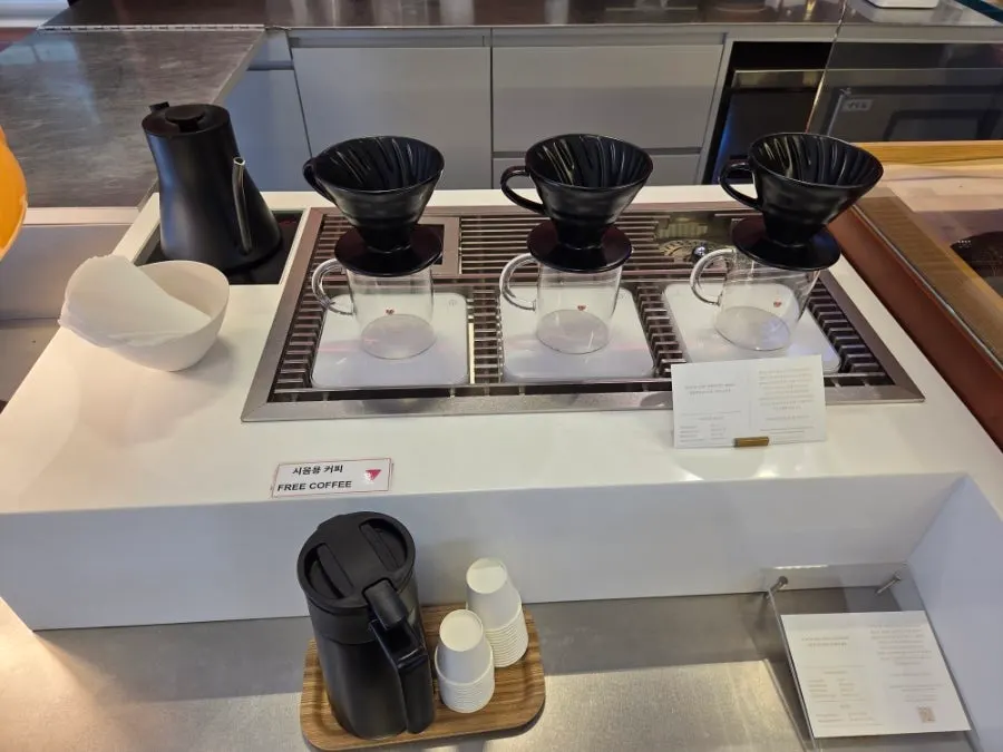 Glass cups on the café merchandise shelf