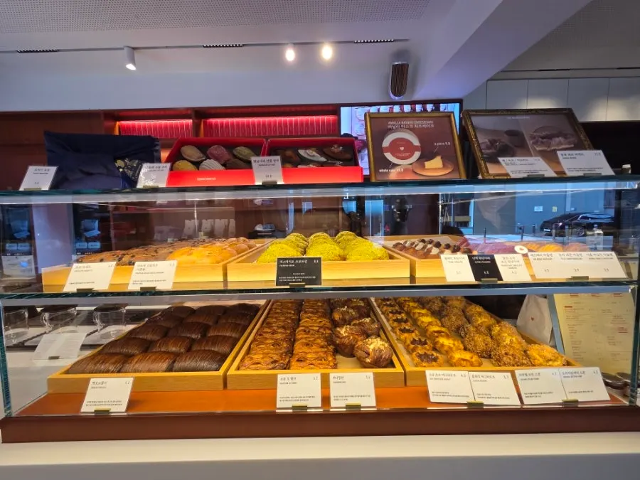 Bread and desserts displayed in the showcase
