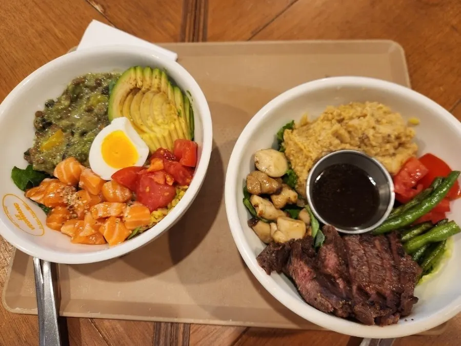 Both the Salmon Bowl and Steak Bowl on the table