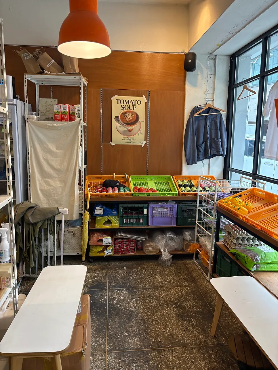 Sign noting pet-friendly and vegan dining options