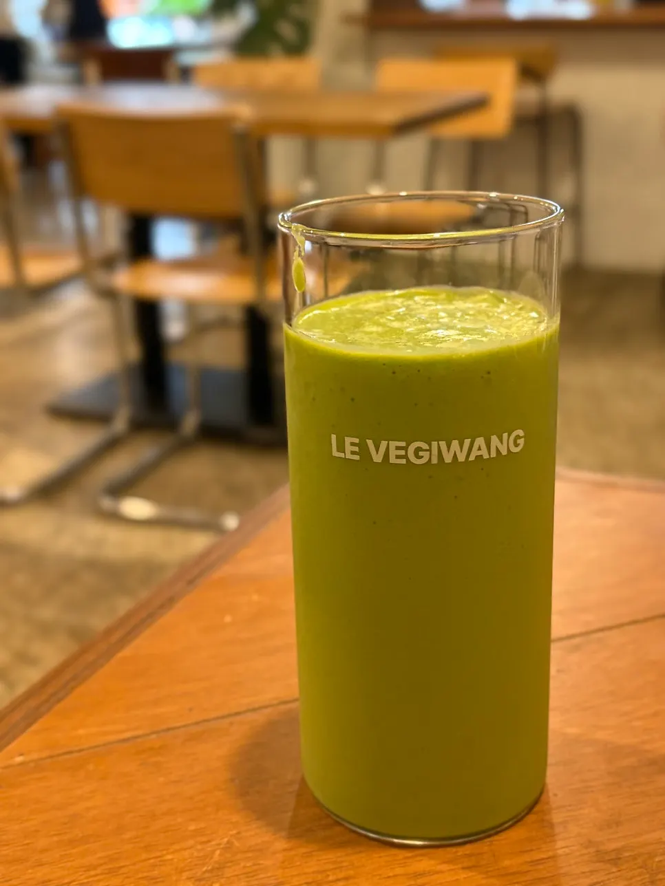 Green smoothie served alongside the poke bowl