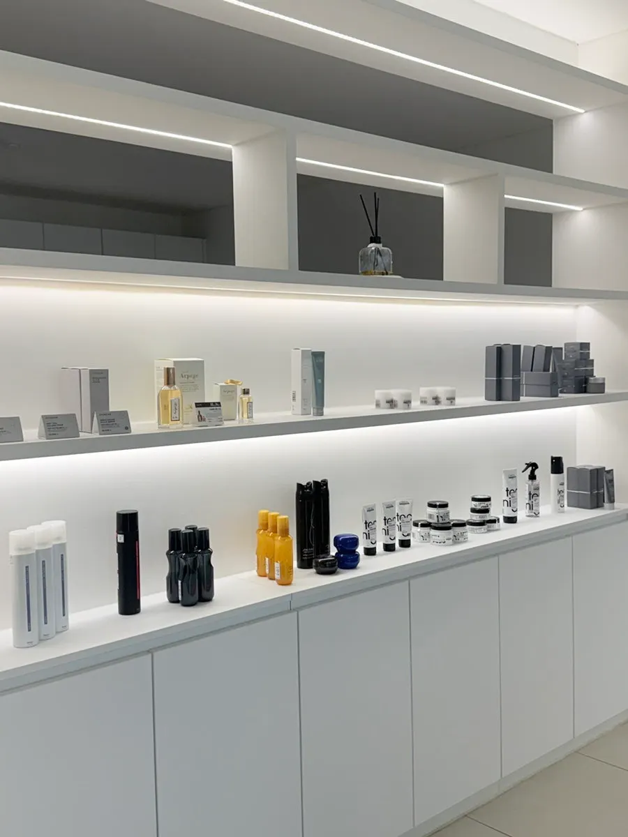 Display shelf of hair care products sold in the store