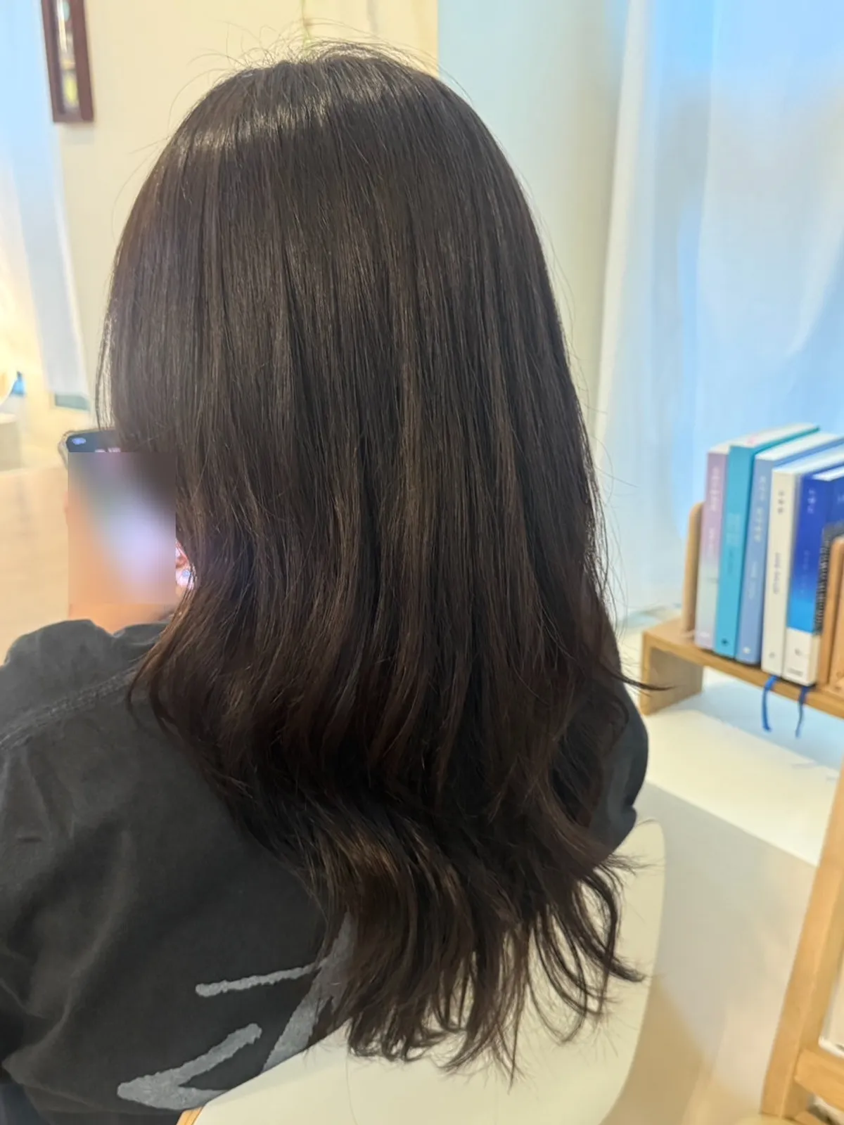 After photo showing shinier hair post-clinic