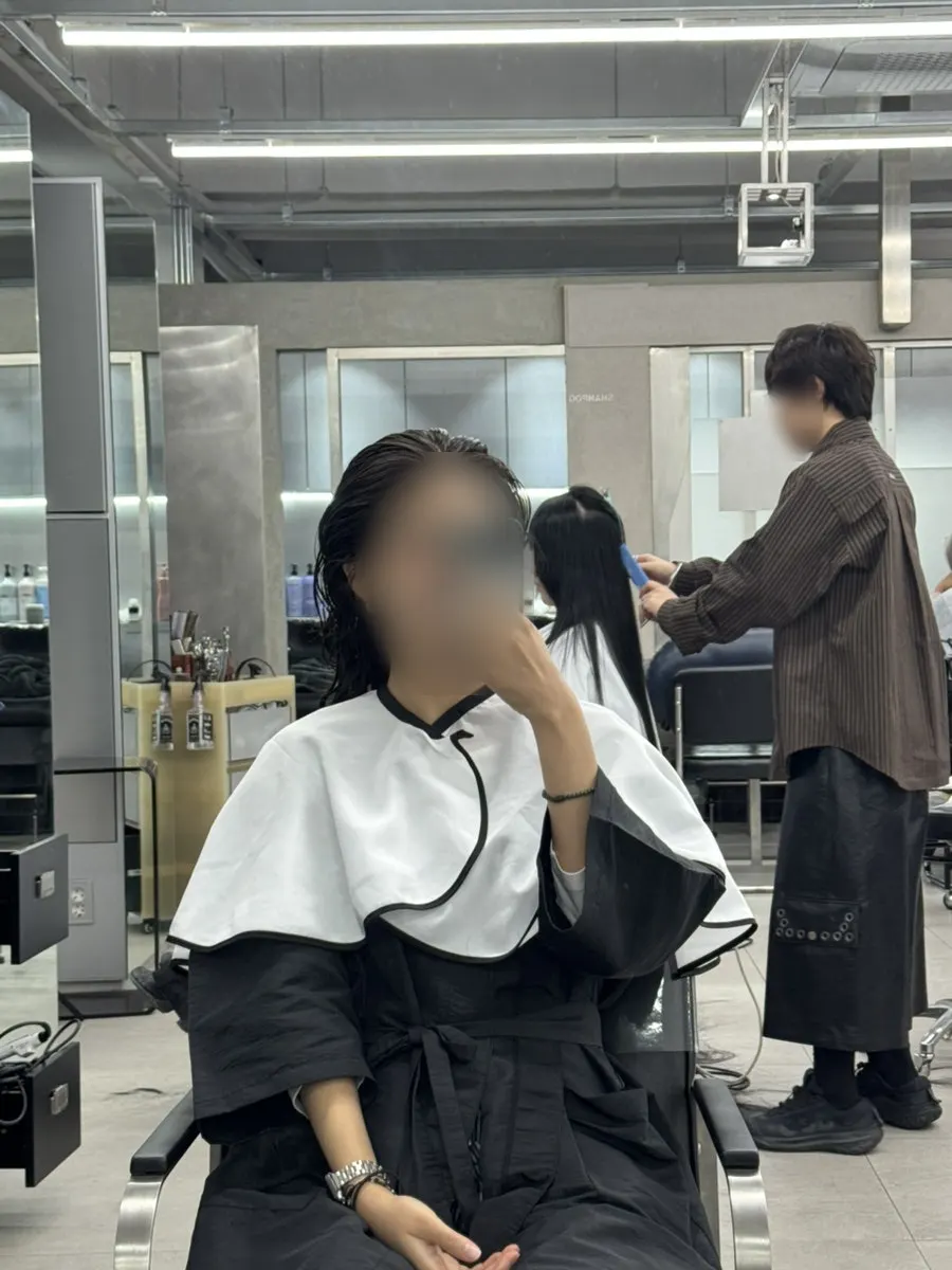 Tone-corrected wet brown hair right after the shampoo