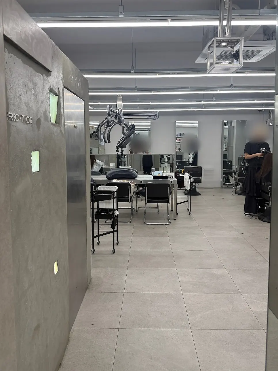 Metal and concrete interior of Recteur Seoul