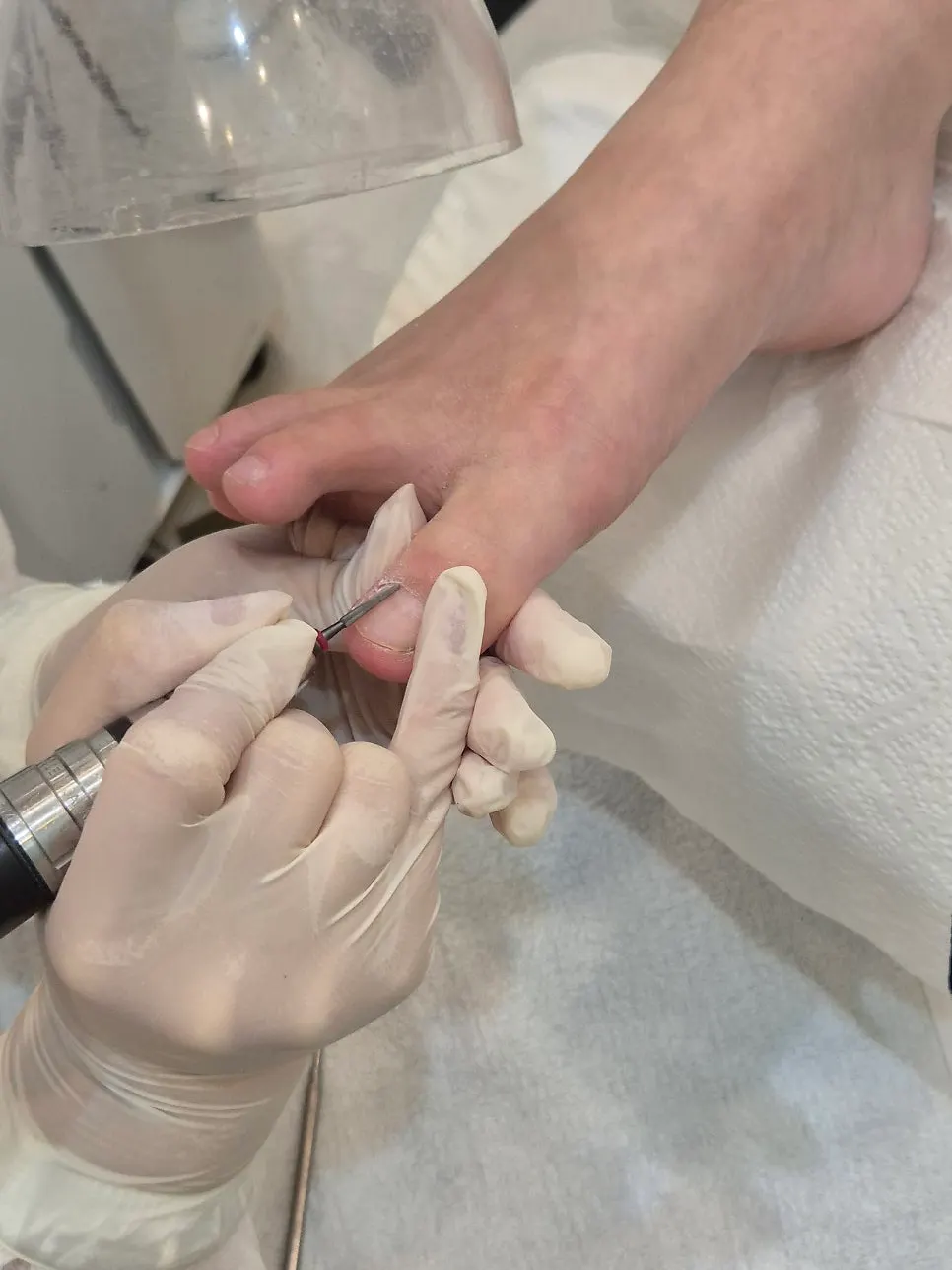 Cleaning up the sharp edge of the nail