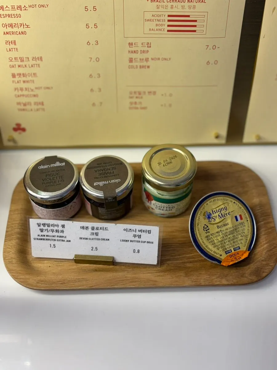 Jam and unsalted butter sold alongside bread