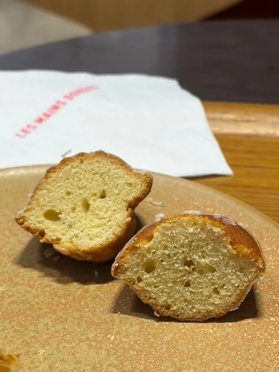 Vanilla madeleine with a thin sugar coating on the outside