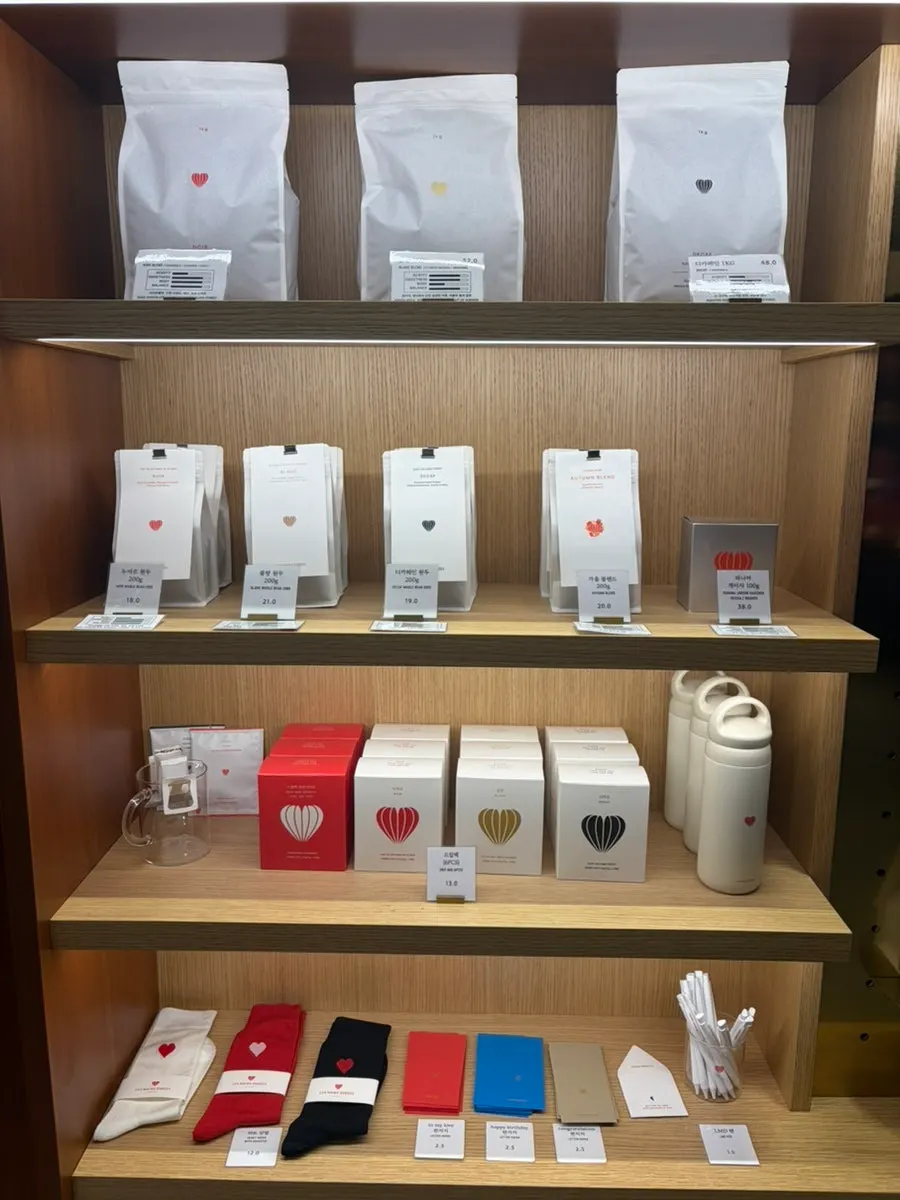 Lemangdoré coffee beans and goods like socks on display