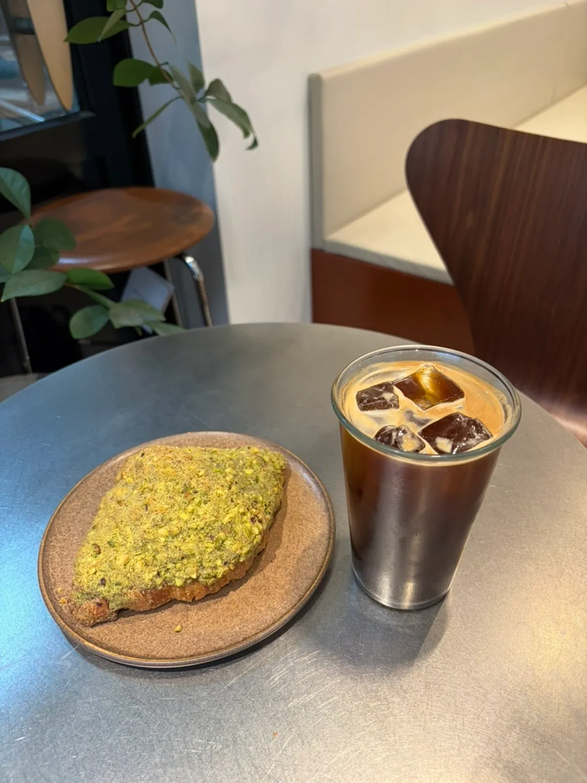 Pistachio croissant and iced americano