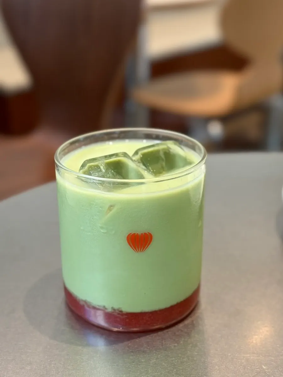 Cup of matcha strawberry latte Noorwegian Forest